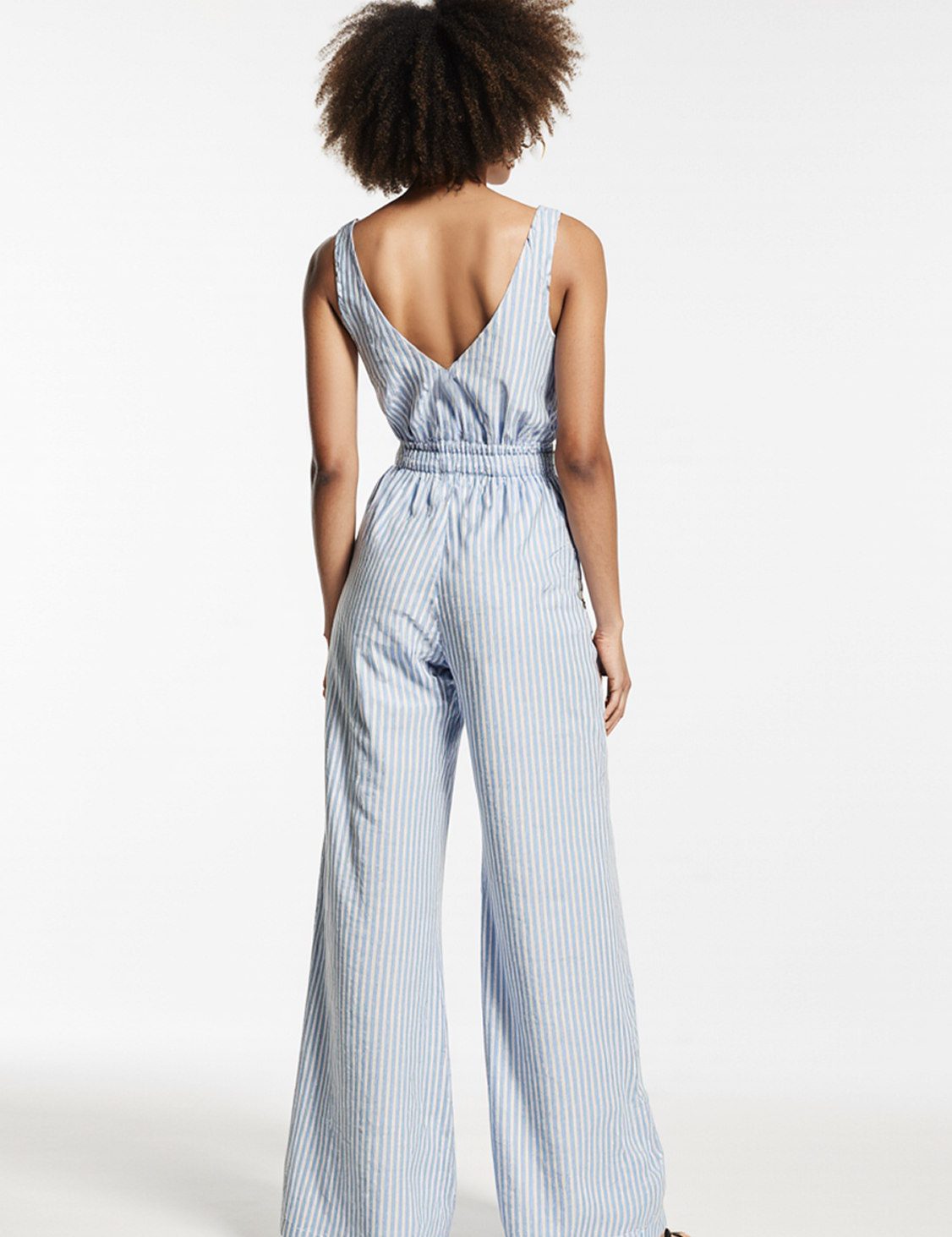 Striped jumpsuit in light blue